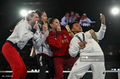 Lin secures gold amid gender row